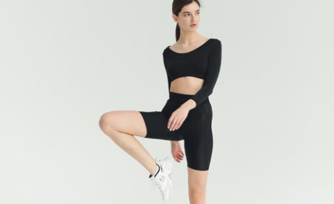 Woman posing in biker short set