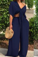 A dark blue two-piece jumpsuit